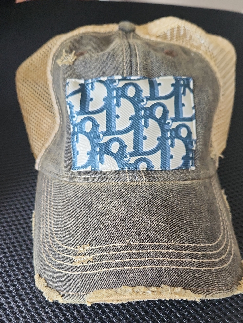 Dior Black & Navy Distressed Trucker Cap in Tan with Blue Logo Patch